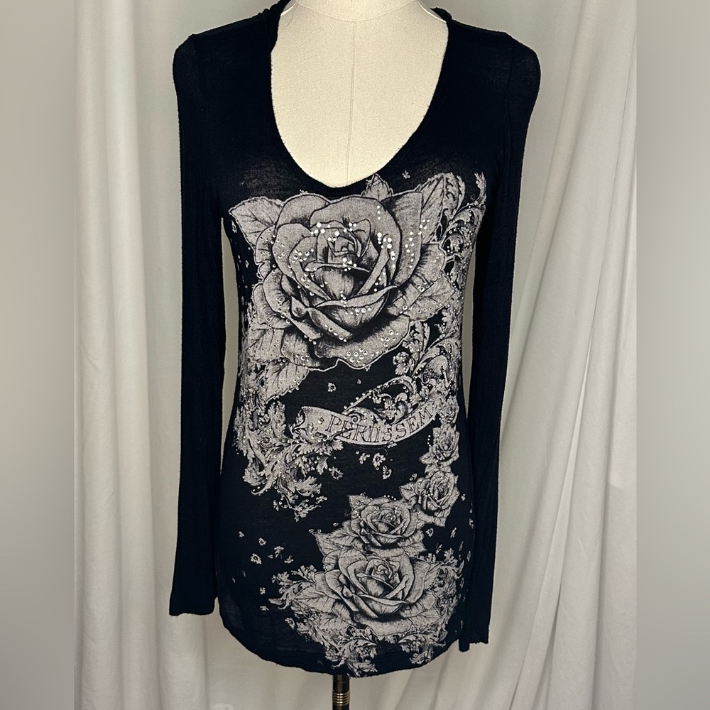 Black slim fitted hoodie tunic with embellished floral design.